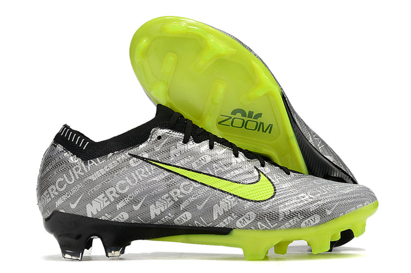 Chuteira Infantil Campo Nike Air Zoom Mercurial Vapor 15 Elite FG Prata e Verde "Nike 25 Anos"